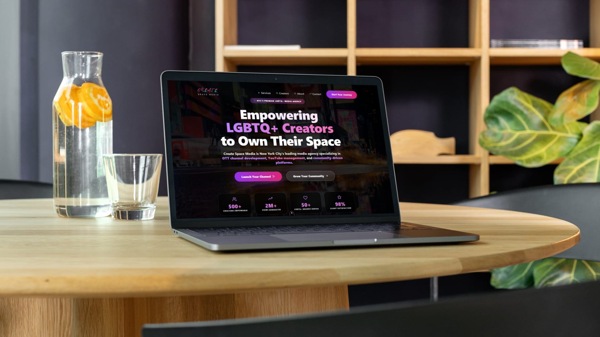 Create Space Media website shown on a laptop on a desk